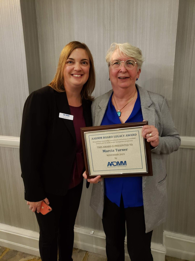 Marcia with a colleague at the AADMM award presentation